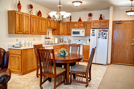Large kitchen in Ellen Kennedy Living Center independent living condominium